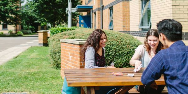 Students sat outside at Clarence Dock